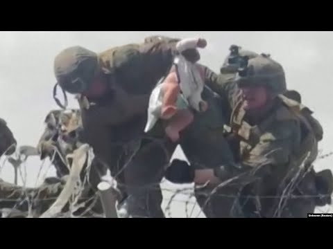 Desperate Afghans Hand Babies To Soldiers At Kabul Airport