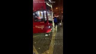 Ambulance Overturns After Colliding With Bus in Westminster