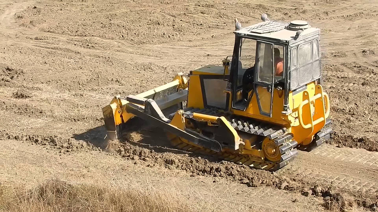 Experience Operating Skills Of Machinery Komatsu Dozer D31P Pushing Stone And Dump Truck Dumping