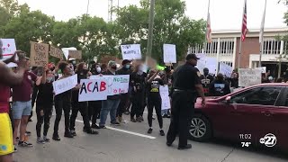 Protesters demonstrate outside Tallahassee Police Department