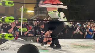 Nick Gage takes a Light Tube Elbow Drop from Ricky Shane Page at Spring Break 2021