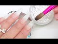 Uñas acrílicas brillosas y finas para novia👰