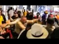 Cop Pulls Gun On Crowd At Miami Airport Brawl VIDEO 