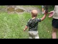 Toddler Slip In Puddle A Hilarious Fall Caught On Camera WooGlobe 
