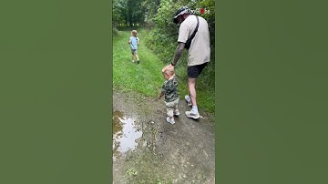 Toddler Slip in Puddle: A Hilarious Fall Caught on Camera || WooGlobe