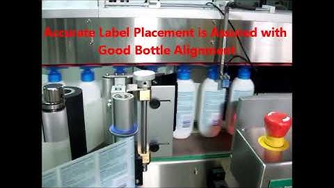 LabelOn™ Aligning Chains - Oval Bottle Labeling 150 Bottles Per Minute