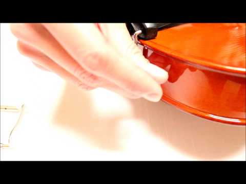 Como ajustar la barbada de un violin