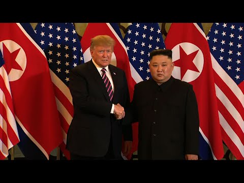 Trump and Kim shake hands in Hanoi