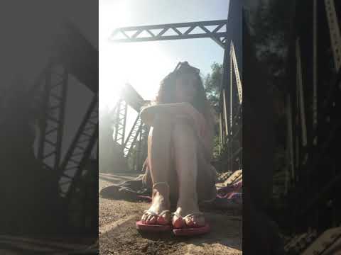 Wearing flip flops then barefoot on the canal bridge
