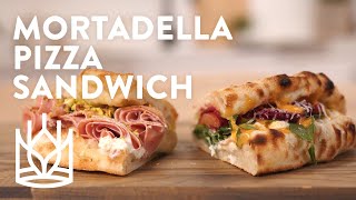 Mortadella Pizza Sandwich with fresh cheese and pistachio