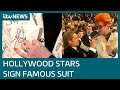 Brad pitt et leonardo dicaprio parmi les stars signant le clbre costume de sandy powell  actualits itv