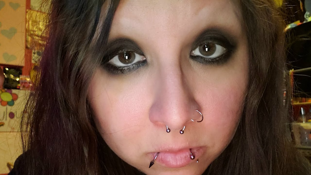 Turning grungy eyeliner into a simple smoky goth eye look. 
