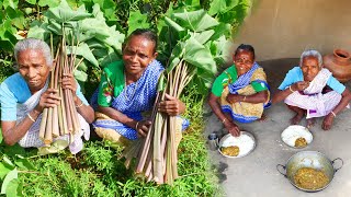 Tribe grandmothers cooking Kochur Shaag recipe for their lunch curry | cooking green taro plant