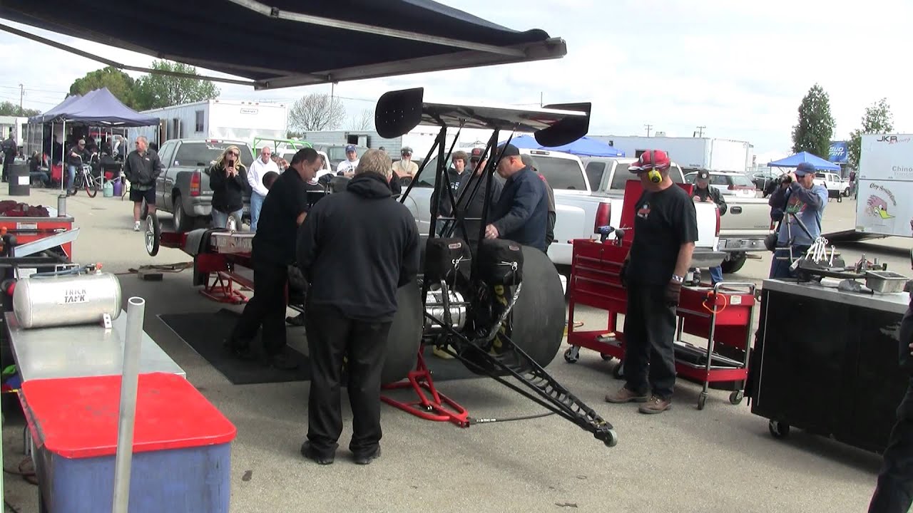 Rain for Rent Rear Engine Nostalgia Top Fuel Dragster in the pits March