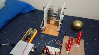 Wireless link powering an electronic electrostatic machine.