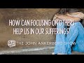 How can focusing on others help us in our sufferings?