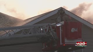 Crews battle house fire in southeast Sioux Falls