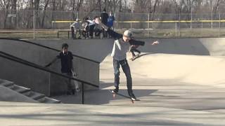 Front feeble grind hand rail at Veterans Skatepark with Douglas Burning