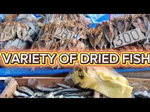 VARIETY OF DRIED FISH AND UKAY UKAY DISPLAYED IN TABO AN OR WEEK END MARKET//WIESER BUD