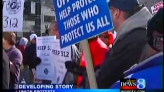 Police, firefighters protest in Lansing