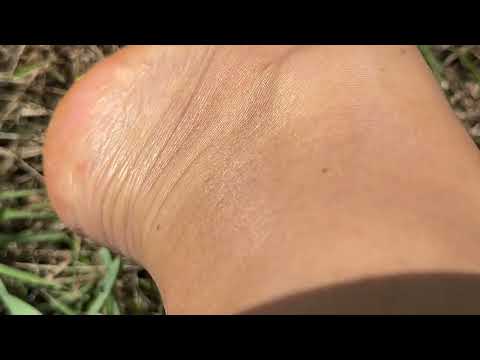 relaxing barefoot walk on the grass