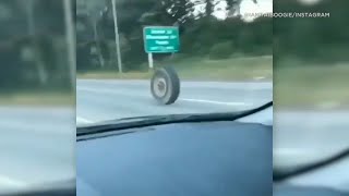 Loose truck tire rolls and bounces down New Jersey highway, smashes into Jeep | ABC7