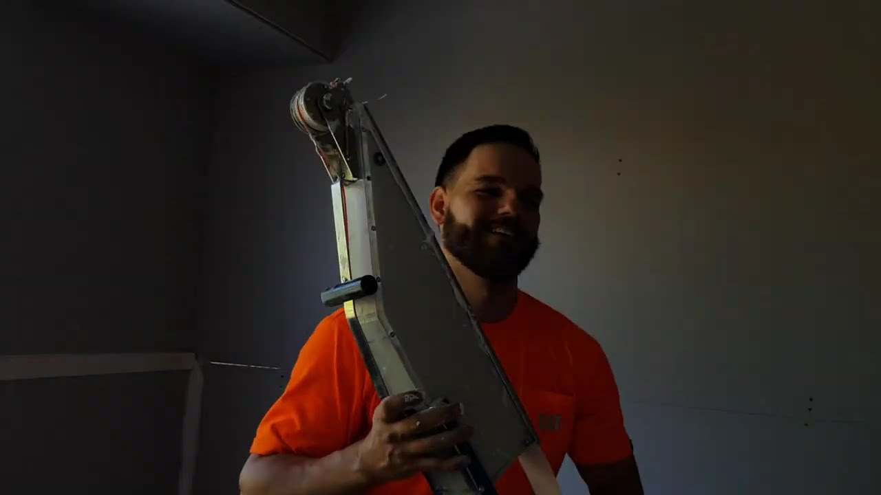 Drywall Finishing Crew Makes Taping Drywall Look Easy with This Tool
