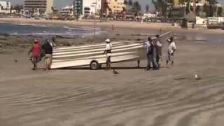 Hauling Fishing Boats by Hand in Mazatlan, Mexico
To read the entire story about my visit to Mazatlan, Mexico, go to https://holeinthedonut.com/2010/03/04/mazatlan-malecon-cliff-divers-lighthouse/, and if you enjoyed this video, please consider subscribing to my YouTube channel.
In Mexico, they still do many things without the assistance of heavy machinery or fancy gadgets. In Mazatlan, a group of fishermen drag a fishing boat out of the water by hand, using nothing more than a straight axle with two wheels and their brawn. Hauling Fishing Boats by Hand in Mazatlan, Mexico