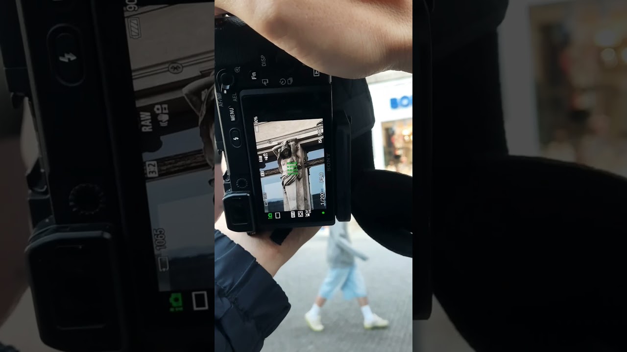 Street photography. Sculpture: Art on Building Facades in Prague 