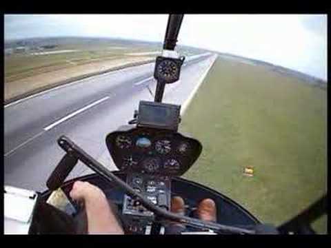 robinson R22 helicopter hover taxi then take of on...