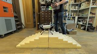 After many iterations, my quadruped robot finally climbed stairs!