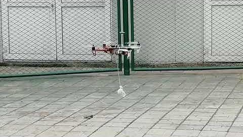 Hovering flight with slung load