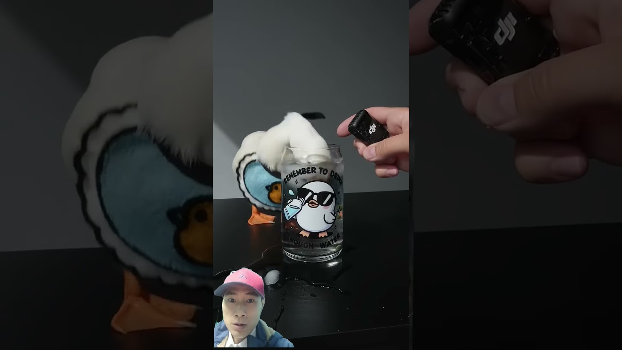 The duck stuck its head in a glass of ice water. 