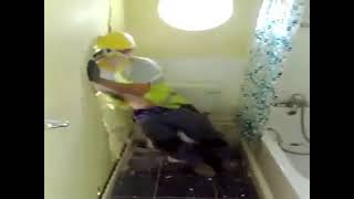 guy on toilet gets dragged through wall