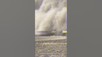 Massive dust storm looms after tractor 😳