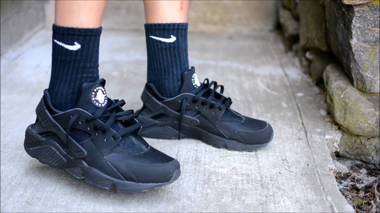 triple black huaraches on feet