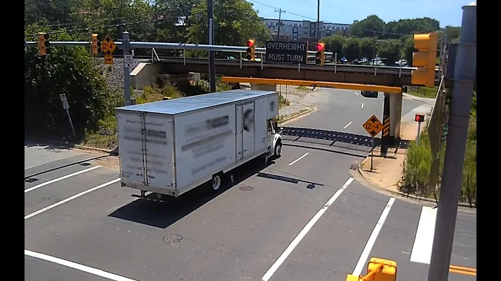 Moving truck runs red light and scrapes the 11foot8+8 bridge