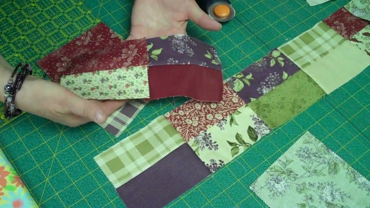 Jenny assembling the scrappy four patch blocks