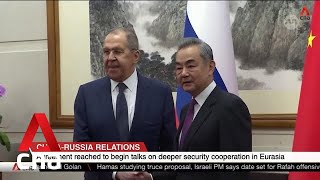 Russia and China pledge to deepen security cooperation as Lavrov visits