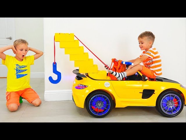 Vlad and Nikita play with Toy Tow Truck for children class=