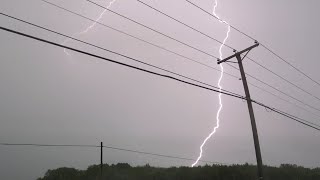 Close lightning strikes with loud thunder