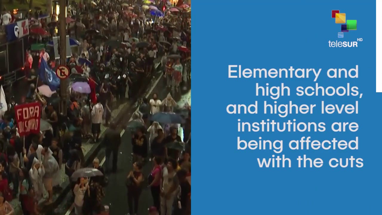 Thousands protest against education cuts in Brazil - YouTube