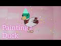 Painting a duck on a canvas the creative