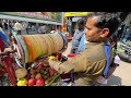 Mix fruits ice cream making on hand roller  street food
