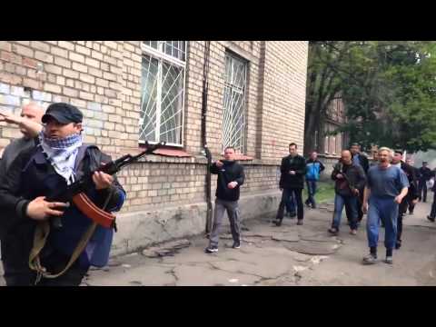В Мариуполе людей убивали боевики-националисты в гражданской одежде
