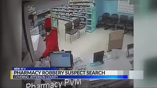 Police search for pharmacy robbery suspect