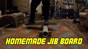 Throwing down on the homemade snowboard jib board
