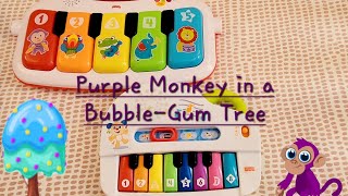 Purple Monkey in a Bubble-Gum Tree on a kids toy piano