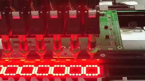 SMT assembly  machine with one head, 8 nozzles, 8 bottom cameras and one camera for big components.