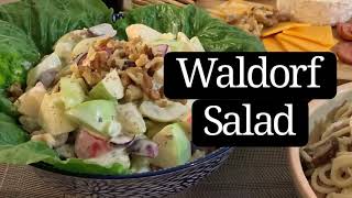 WALDORF SALAD RECIPE | a salad with green and red apples, grapes, celery and topped with walnuts